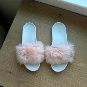 Pink fluffy ugg slides